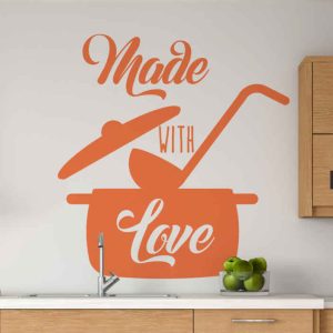 استیکر دیواری آشپزخانه جنس پی وی سی رنگ نارنجی نصب شده در آشپزخانه