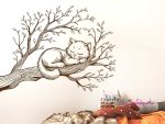 عکس برچسب دیواری شاخه با طرح بچه گربه خوابیده