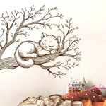 عکس برچسب دیواری شاخه با طرح بچه گربه خوابیده