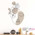 عکس چهره با گل روی دیوار
