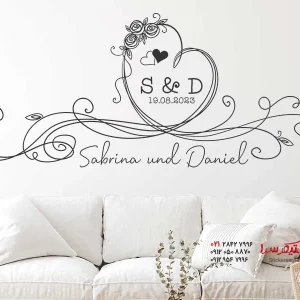 عکس استیکر دیواری طرح قلب با گل رز و اسم