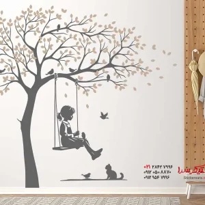 عکس برچسب دیواری درخت با دختر در حال تاب خوردن