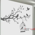 عکس برچسب دیواری شاخه تزئینی با قفس پرنده