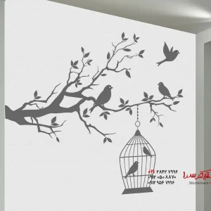عکس برچسب دیواری شاخه تزئینی با قفس پرنده