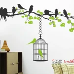 عکس برچسب دیواری شاخه دو رنگ با قفس پرنده