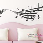 عکس برچسب دیواری تزئینی به شکل نت موسیقی منحنی با نت‌ها و کلیدهای مختلف