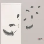 پرهای برچسب دیواری روی درب