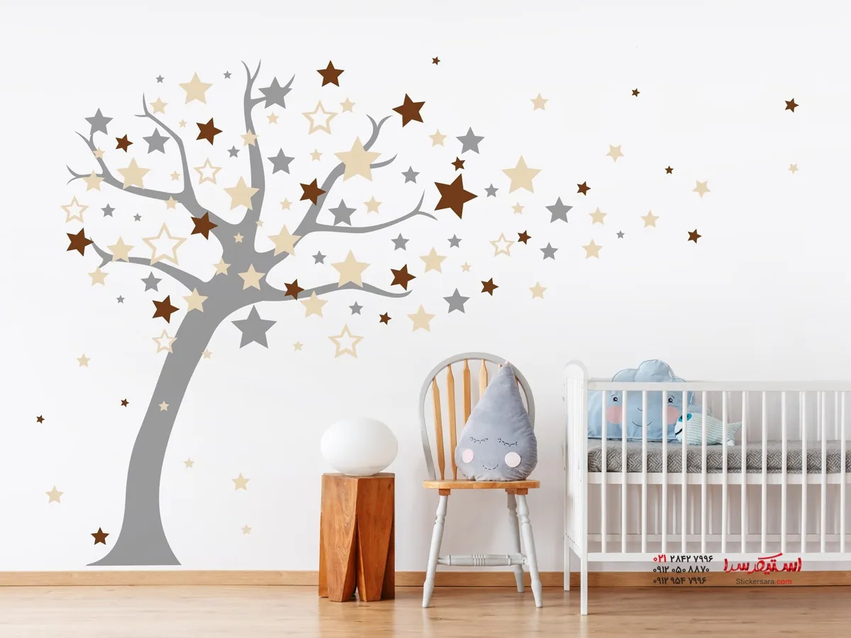 استیکر دیواری درخت با ستاره بالای تخت کودک